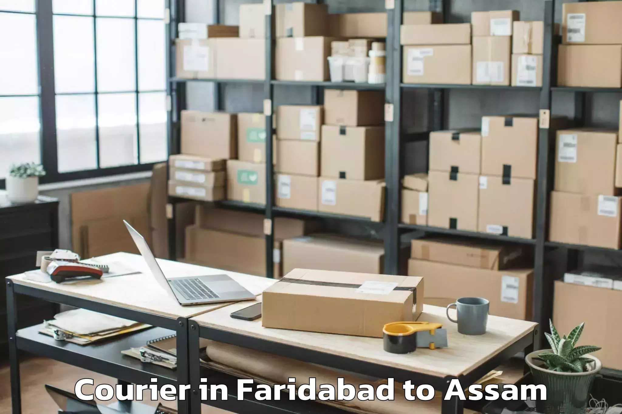 Book Faridabad to Lilabari Airport Ixi Courier Online